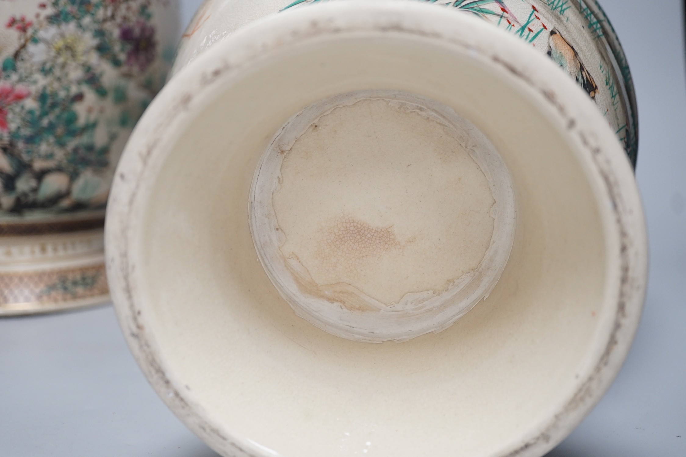 A pair of Japanese Satsuma pottery vases, Meiji period signed above foot, height 38cm